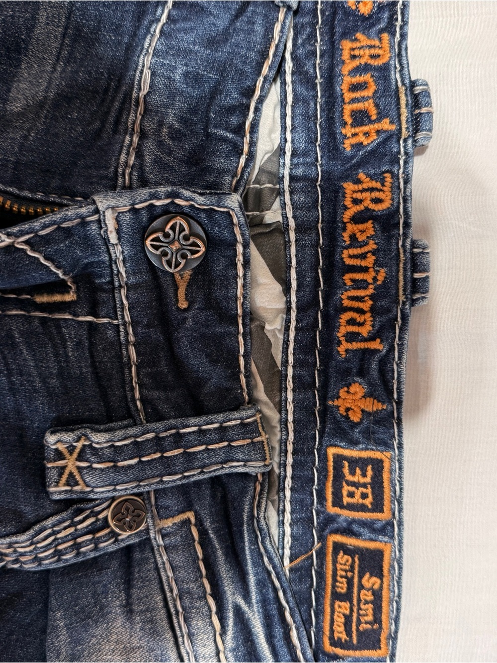 Rock Revival Men’s Indigo Slim Jeans with Orange Embroidery